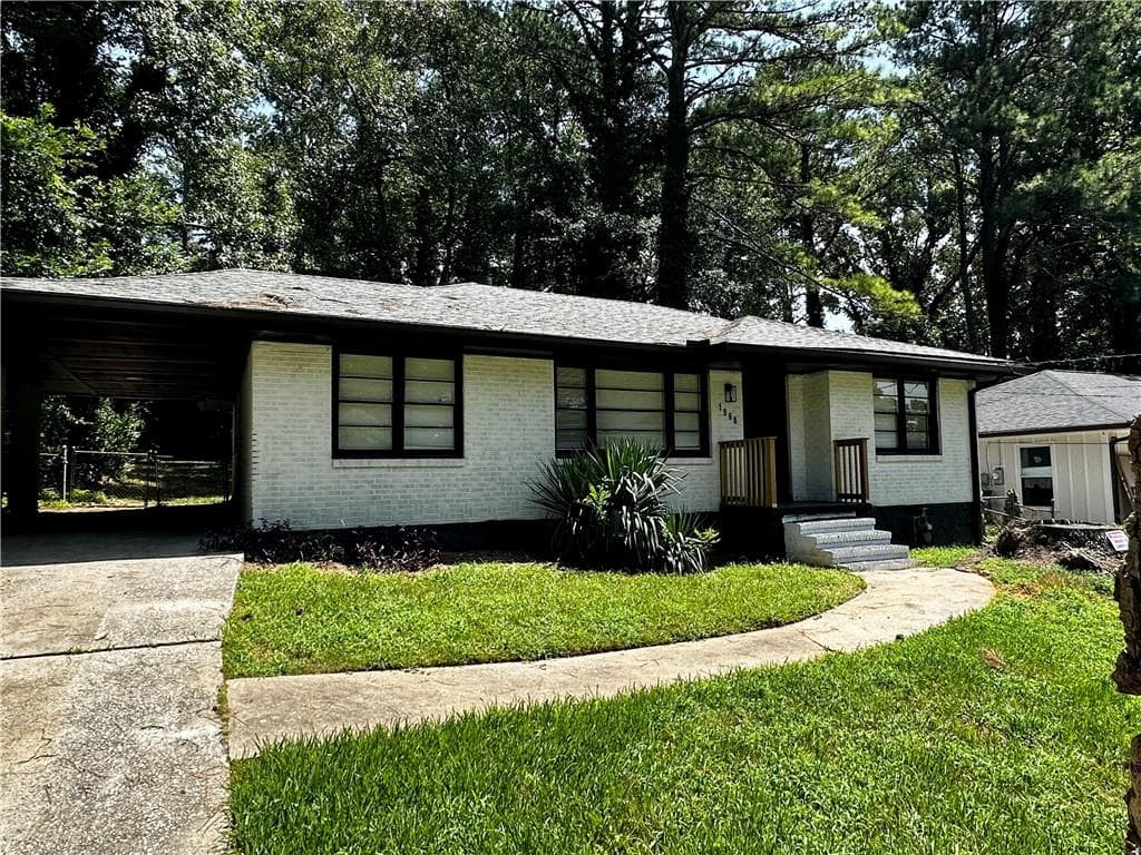 3 bedroom, 2 bathroom, 1,258 sq ft single family residence for sale at 1968 Rosewood Road, Decatur, GA 30032