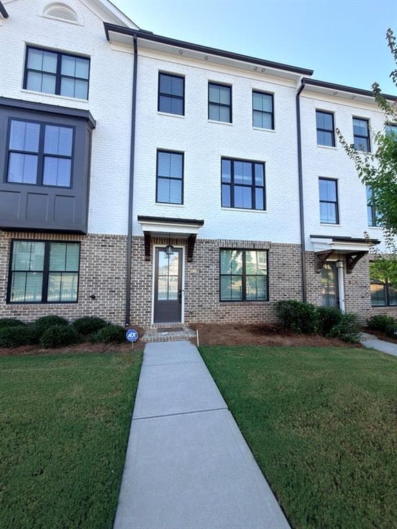 3 bedroom, 4 bathroom, 2,100 sq ft townhouse for rent at 605 Millcroft Boulevard, Buford, GA 30518 for $2,750 a month — photo 1 of 8