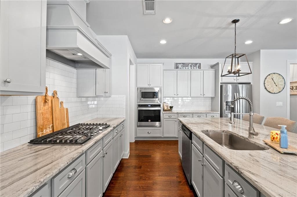5 bedroom, 4 bathroom, 4,383 sq ft single family residence for sale at 2440 Sunflower Drive, Hoschton, GA 30548 — photo 9
