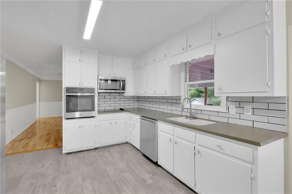 3 bedroom, 2 bathroom, 2,036 sq ft single family residence for sale at 2666 Abilene Trail, Snellville, GA 30078 — photo 2