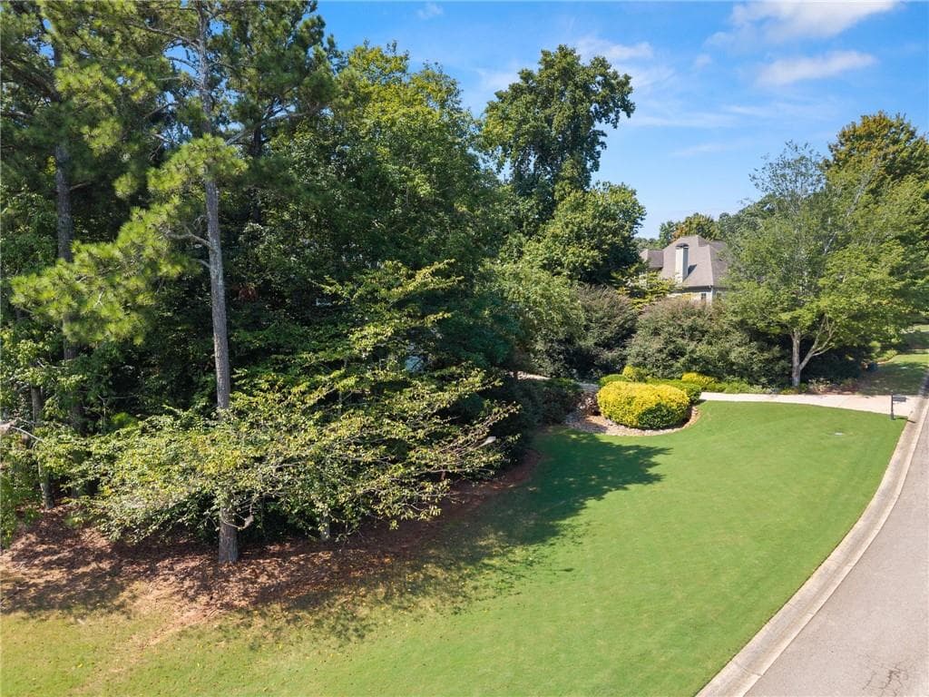 4 bedroom, 3 bathroom, 3,062 sq ft single family residence for sale at 4614 Chartwell Chase Court, Flowery Branch, GA 30542 — photo 3