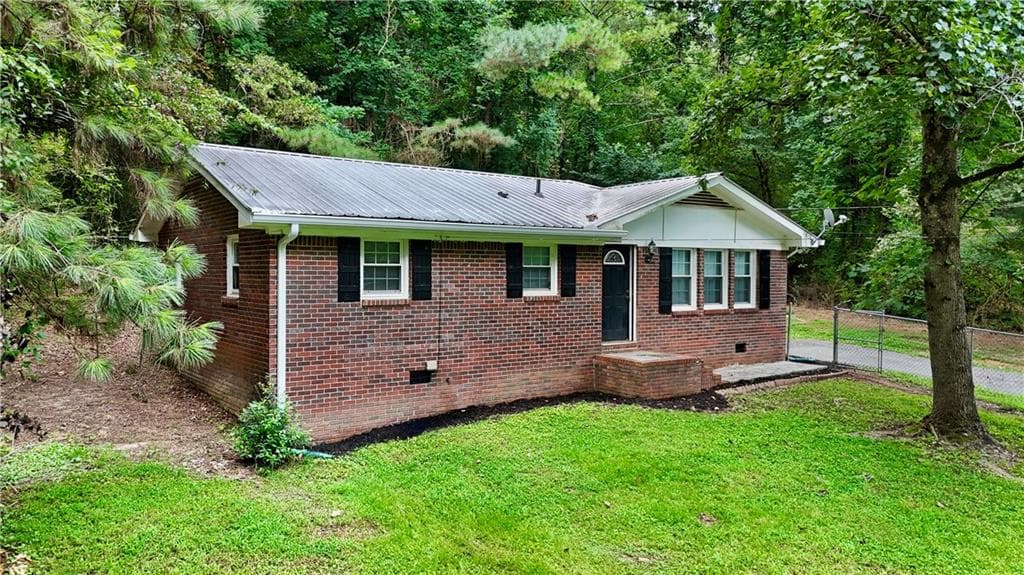 3 bedroom, 1 bathroom, 1,075 sq ft single family residence for sale at 227 Cantrell Drive, Plainville, GA 30733 — photo 2