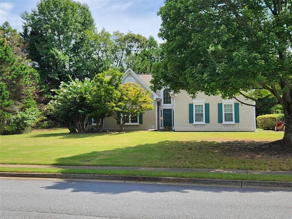 4 bedroom, 3 bathroom, 2,185 sq ft single family residence for sale at 4225 Ruby Forest Boulevard, Suwanee, GA 30024