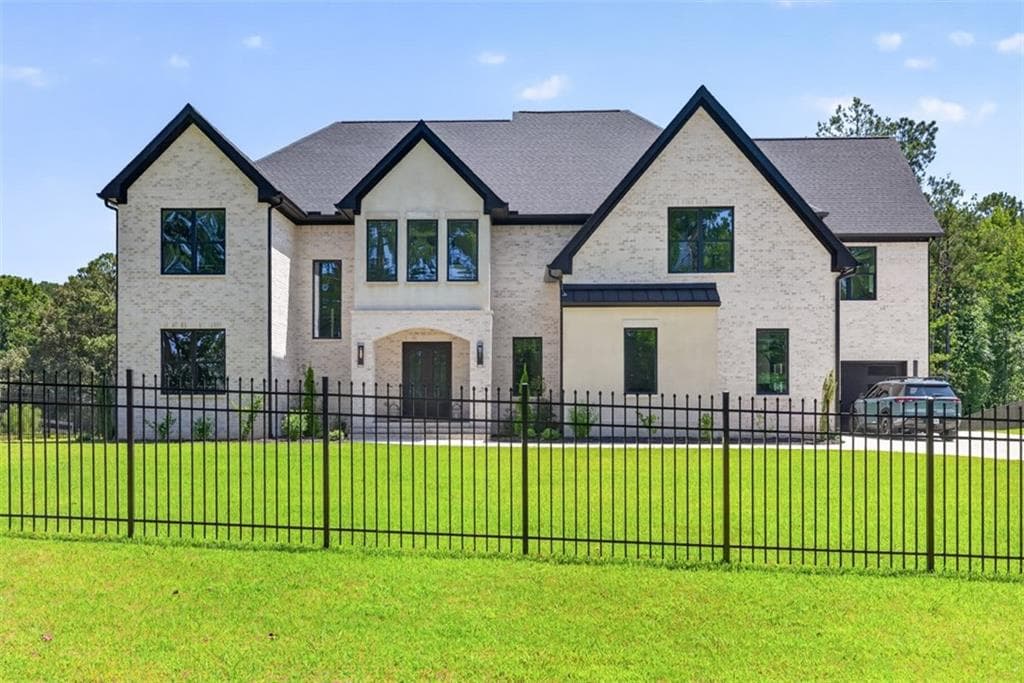 6 bedroom, 6 bathroom, 8,424 sq ft single family residence for sale at 1255 Em Croy Road, Buford, GA 30518 — photo 2