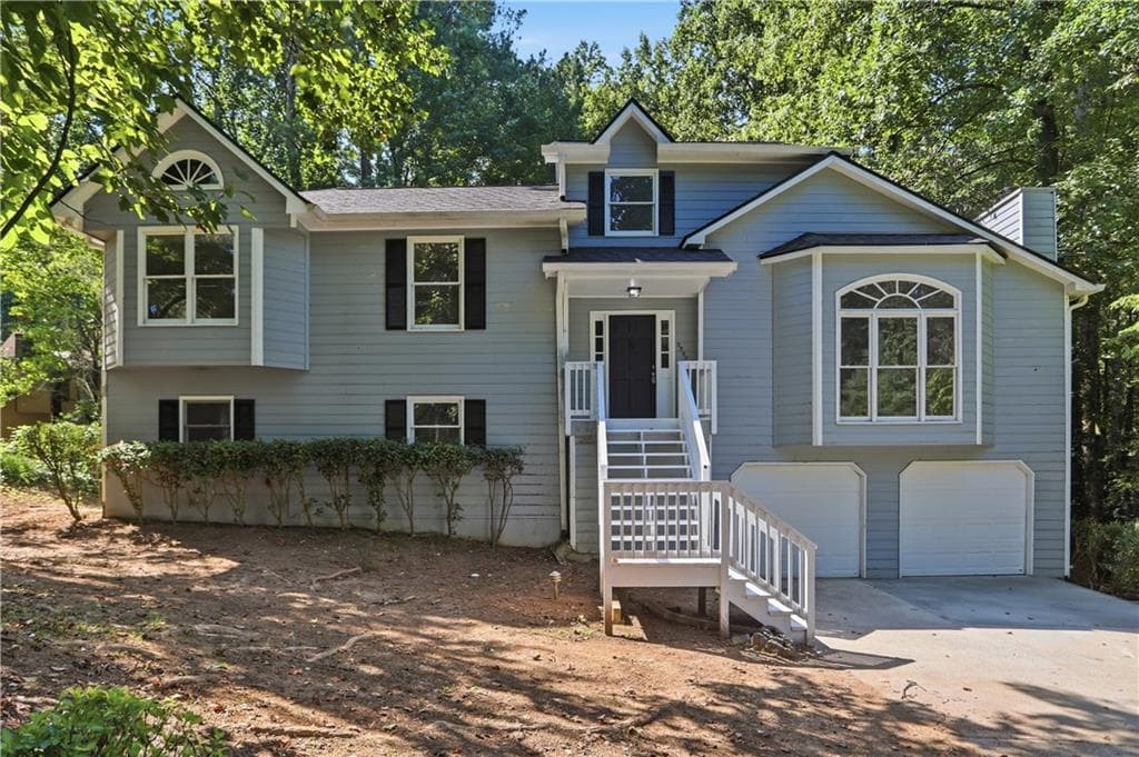 5 bedroom, 3 bathroom, 2,834 sq ft single family residence for sale at 3580 Downing Street, Marietta, GA 30066 — photo 1 of 40