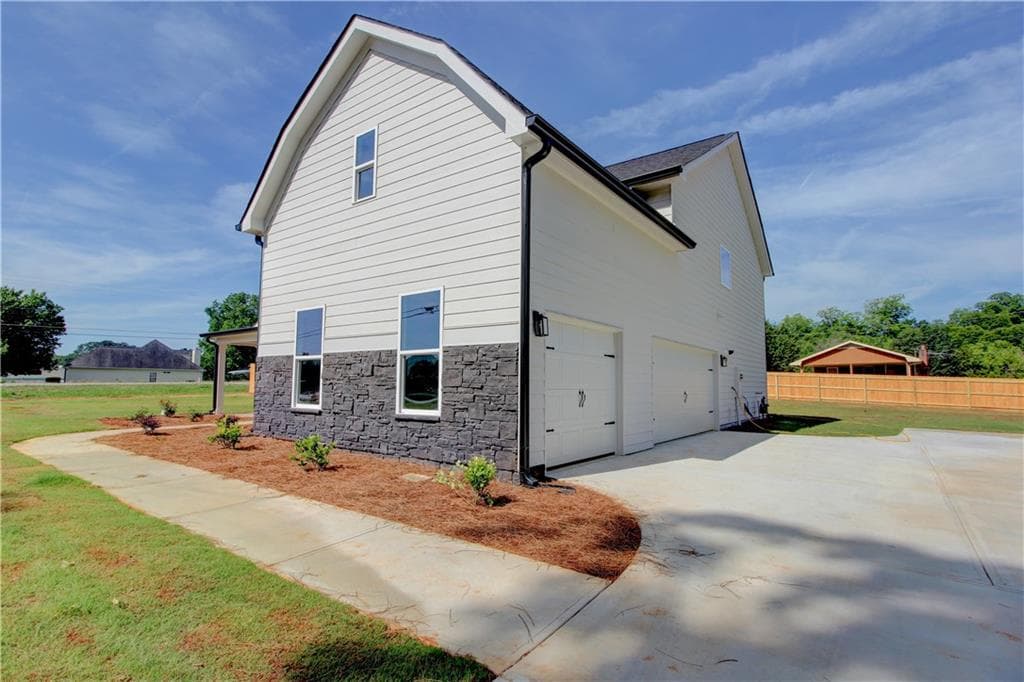 5 bedroom, 4 bathroom, 3,476 sq ft single family residence under contract at 23 Woodland Road, Covington, GA 30016 — photo 3