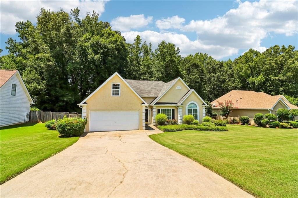 4 bedroom, 2 bathroom, 1,943 sq ft single family residence under contract at 115 Parkside Drive, Stockbridge, GA 30281 — photo 2