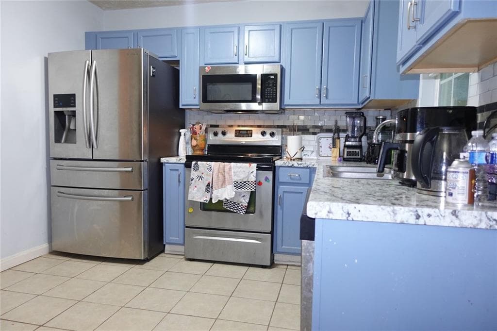 4 bedroom, 3 bathroom, 1,900 sq ft single family residence for sale at 4734 Saddleridge Road, Powder Springs, GA 30127 — photo 9