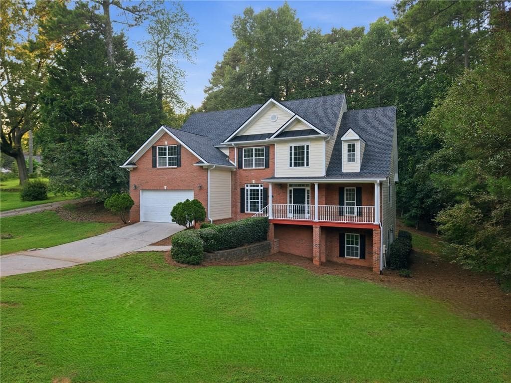 5 bedroom, 3 bathroom, 3,186 sq ft single family residence for sale at 4085 Howell Ferry Road, Duluth, GA 30096 — photo 4