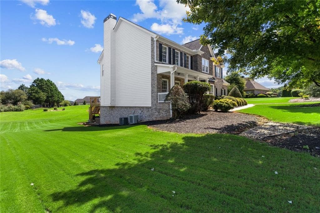 5 bedroom, 4 bathroom, 4,626 sq ft single family residence for sale at 110 Whitaker Way, Hoschton, GA 30548 — photo 4