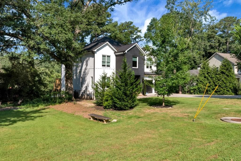 6 bedroom, 7 bathroom, 5,988 sq ft single family residence for sale at 2670 Carlton Place, Brookhaven, GA 30319 — photo 2