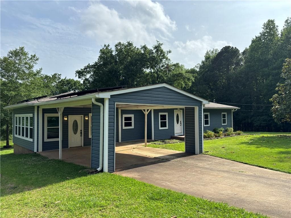 3 bedroom, 2 bathroom, 1,700 sq ft single family residence for sale at 1402 Dewey Street, Griffin, GA 30223 — photo 2