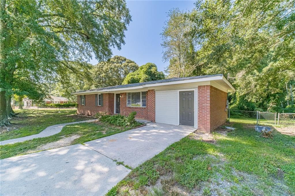 3 bedroom, 1 bathroom, 1,394 sq ft single family residence for rent at 5794 Henry Bailey Road, Sugar Hill, GA 30518 for $1,795 a month — photo 1 of 38