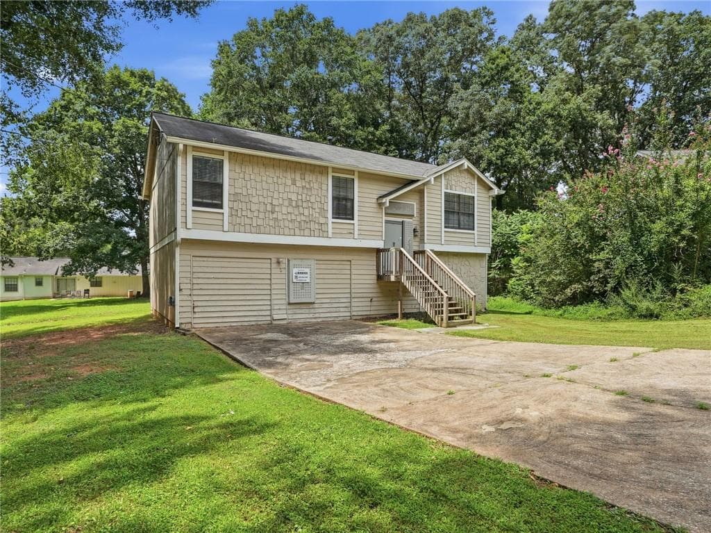 5 bedroom, 3 bathroom, 1,674 sq ft single family residence for sale at 3875 Mcgill Way, Decatur, GA 30034 — photo 3