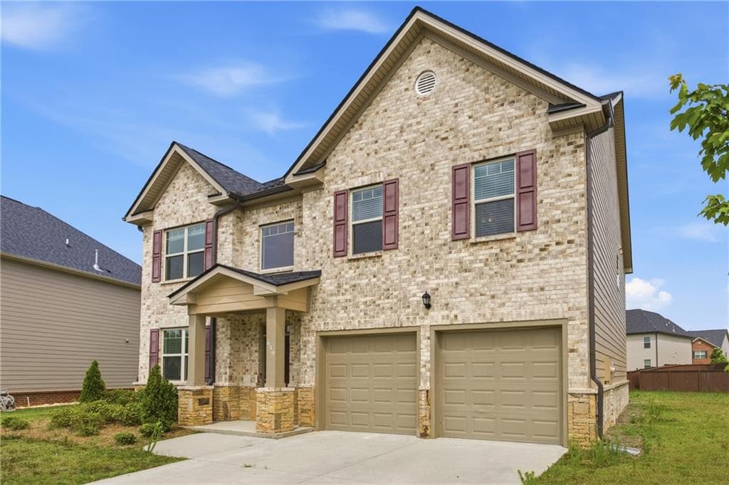 4 bedroom, 3 bathroom, 2,586 sq ft single family residence for sale at 659 Azalea Bloom Drive, Loganville, GA 30052 — photo 2