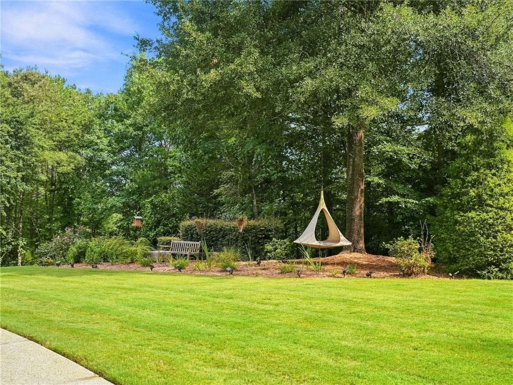 5 bedroom, 7 bathroom, 5,575 sq ft single family residence for sale at 806 Waterford Estates Manor, Canton, GA 30115 — photo 3