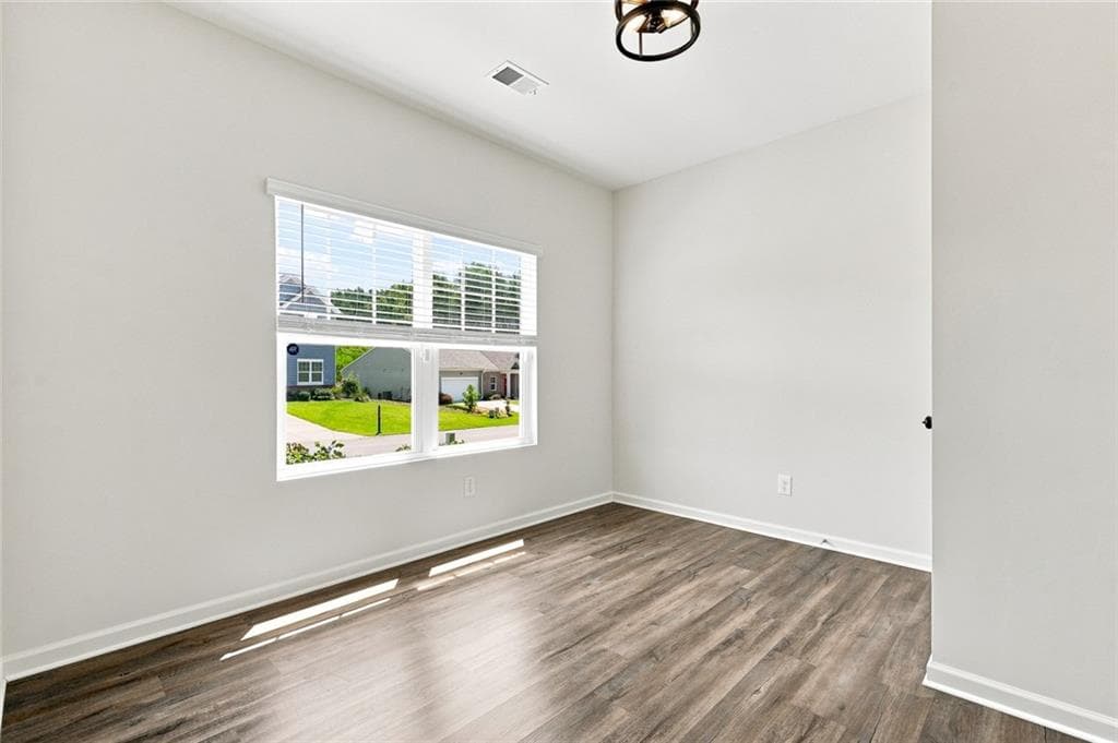 4 bedroom, 3 bathroom, 2,684 sq ft single family residence for sale at 5120 Minnow Lane, Cumming, GA 30028 — photo 4