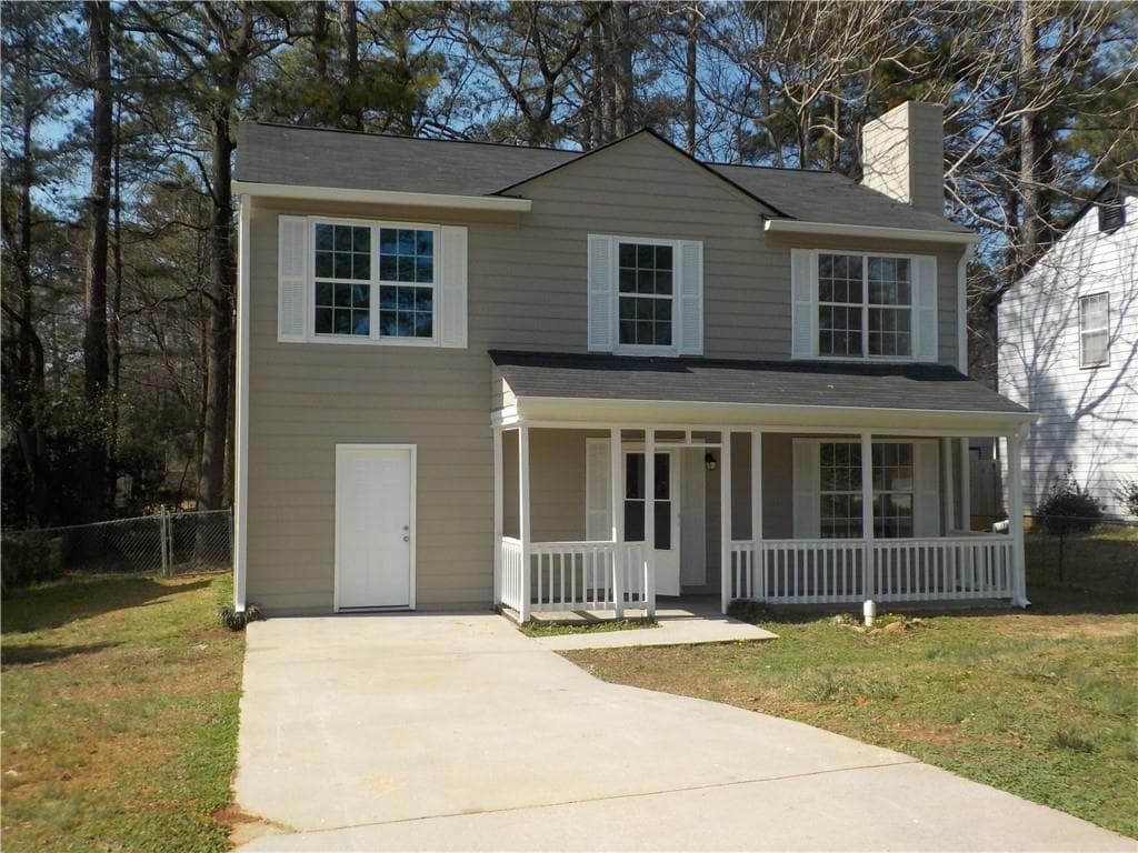 4 bedroom, 3 bathroom, 1,574 sq ft single family residence for sale at 2169 Victoria Place, Lithonia, GA 30058 — photo 2