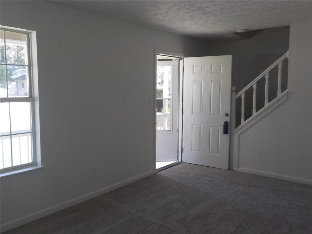 4 bedroom, 3 bathroom, 1,574 sq ft single family residence for sale at 2169 Victoria Place, Lithonia, GA 30058 — photo 4