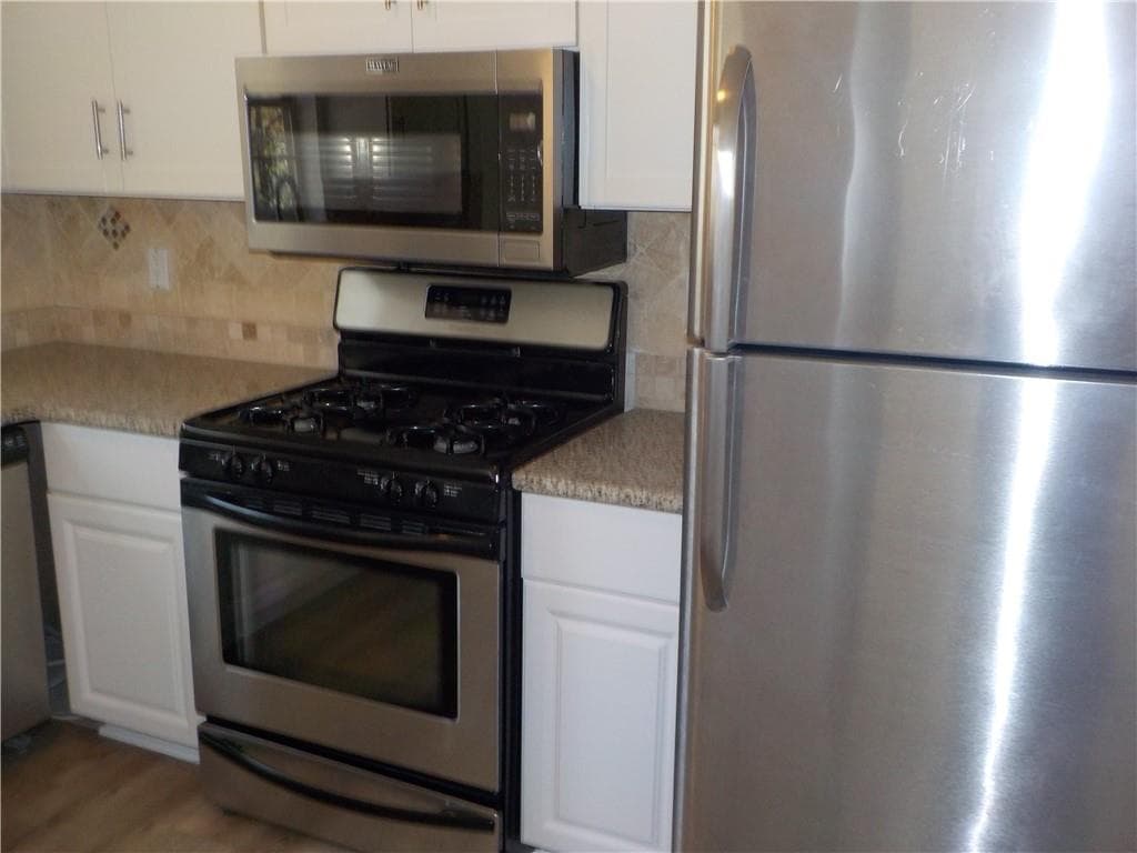 4 bedroom, 3 bathroom, 1,574 sq ft single family residence for sale at 2169 Victoria Place, Lithonia, GA 30058 — photo 8