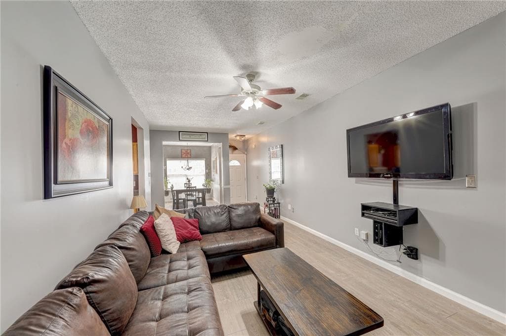 4 bedroom, 3 bathroom, 1,748 sq ft single family residence for sale at 2311 Hackamore Drive, Atlanta, GA 30349 — photo 5