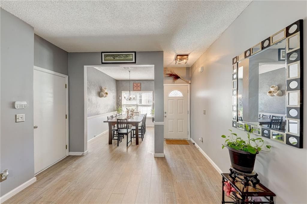 4 bedroom, 3 bathroom, 1,748 sq ft single family residence for sale at 2311 Hackamore Drive, Atlanta, GA 30349 — photo 3