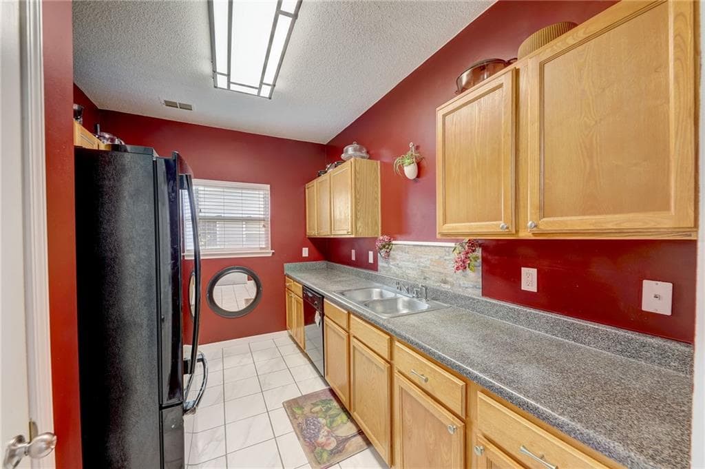 4 bedroom, 3 bathroom, 1,748 sq ft single family residence for sale at 2311 Hackamore Drive, Atlanta, GA 30349 — photo 8
