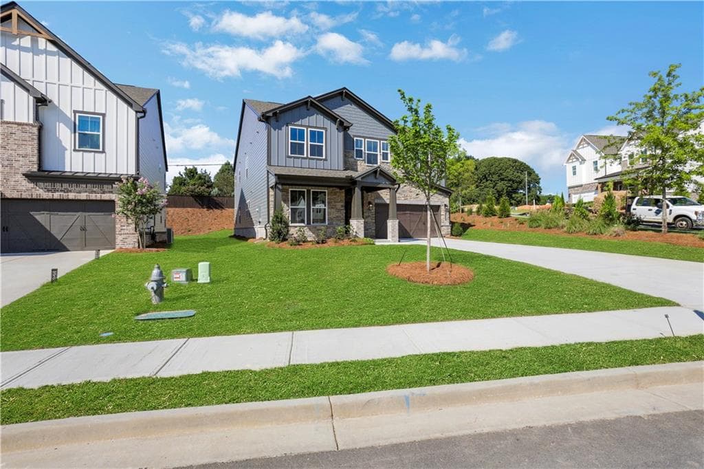 5 bedroom, 4 bathroom, 3,313 sq ft single family residence for sale at 4232 Adler Circle, Buford, GA 30519 — photo 2