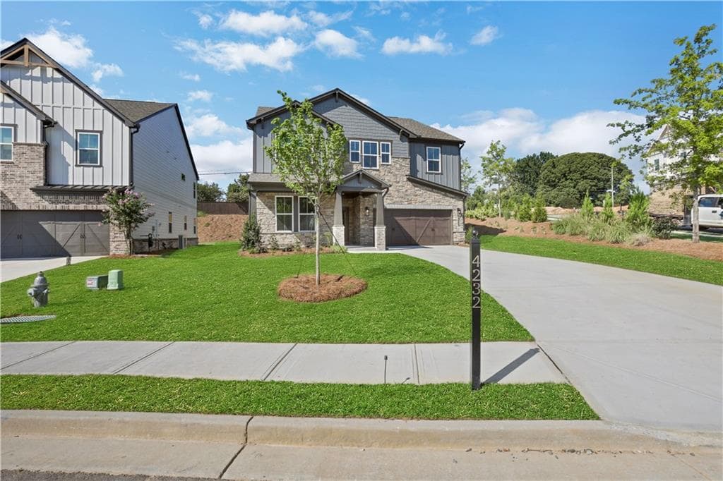 5 bedroom, 4 bathroom, 3,313 sq ft single family residence for sale at 4232 Adler Circle, Buford, GA 30519 — photo 4