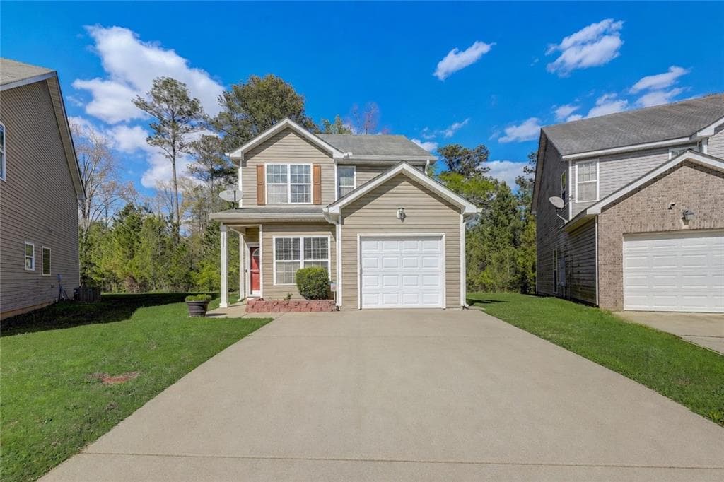 4 bedroom, 3 bathroom, 1,748 sq ft single family residence for sale at 2311 Hackamore Drive, Atlanta, GA 30349 — photo 1 of 24