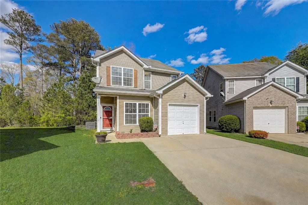 4 bedroom, 3 bathroom, 1,748 sq ft single family residence for sale at 2311 Hackamore Drive, Atlanta, GA 30349 — photo 2