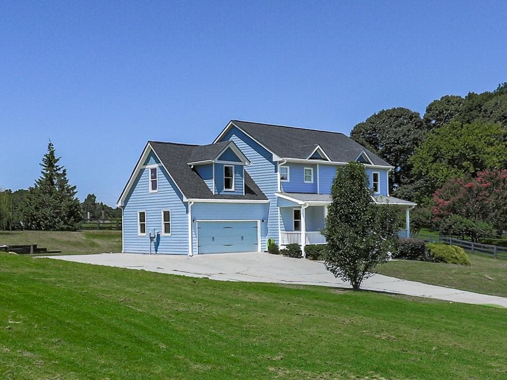 4 bedroom, 3 bathroom, 2,476 sq ft single family residence for sale at 7955 Little Mill Road, Cumming, GA 30041 — photo 5