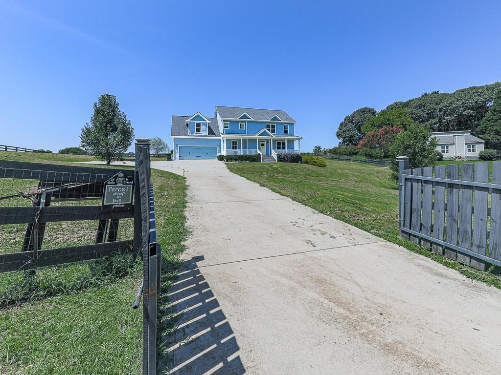 4 bedroom, 3 bathroom, 2,476 sq ft single family residence for sale at 7955 Little Mill Road, Cumming, GA 30041 — photo 3
