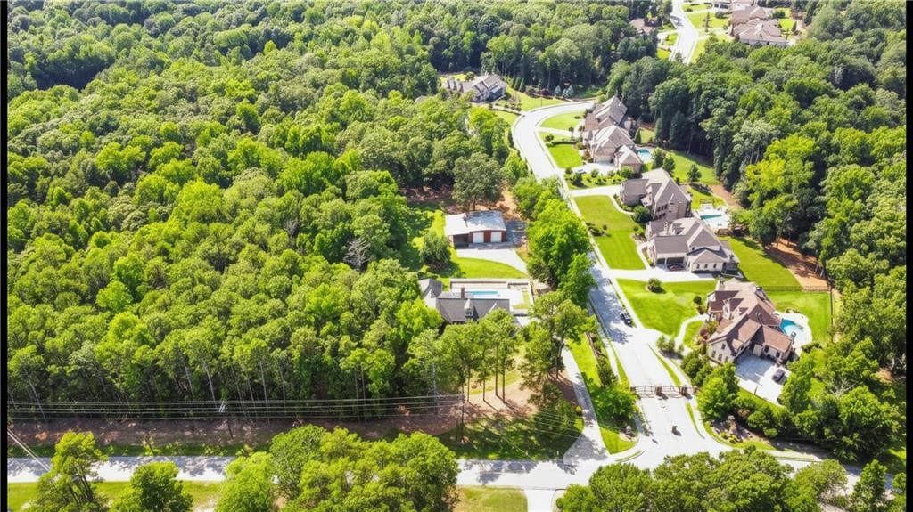4 bedroom, 4 bathroom, 5,373 sq ft single family residence for sale at 2678 N Bogan Road, Buford, GA 30519 — photo 3