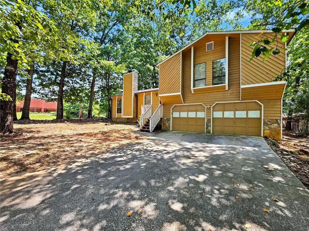 3 bedroom, 2 bathroom, 1,433 sq ft single family residence for sale at 3754 Lamar Way, Snellville, GA 30039 — photo 2