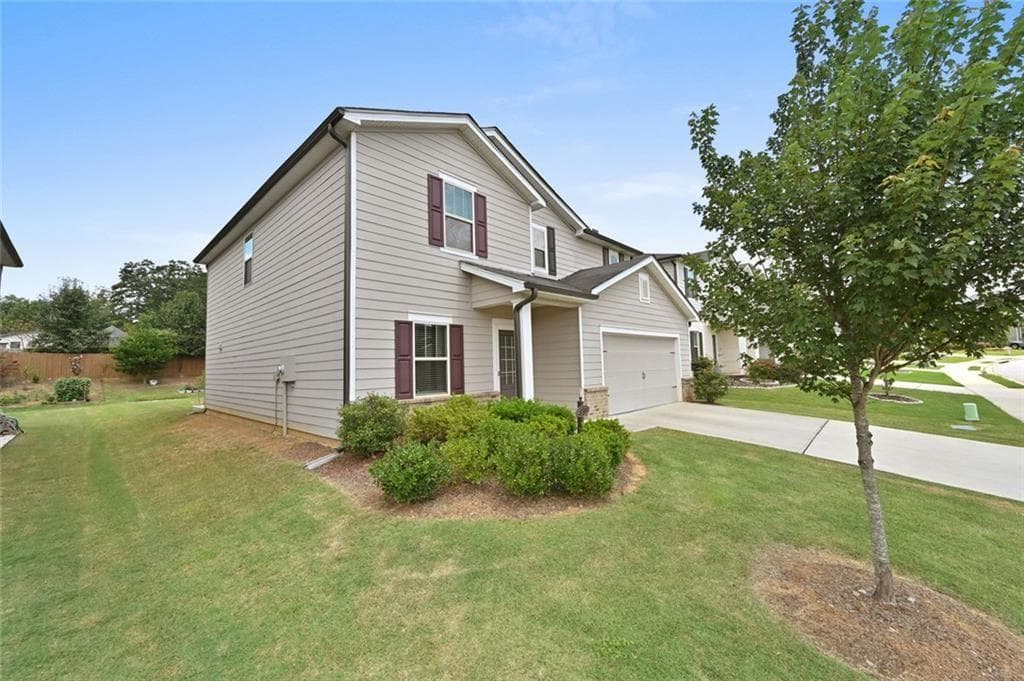 4 bedroom, 3 bathroom, 2,479 sq ft single family residence for sale at 4939 Dufour Drive, Lilburn, GA 30047 — photo 2
