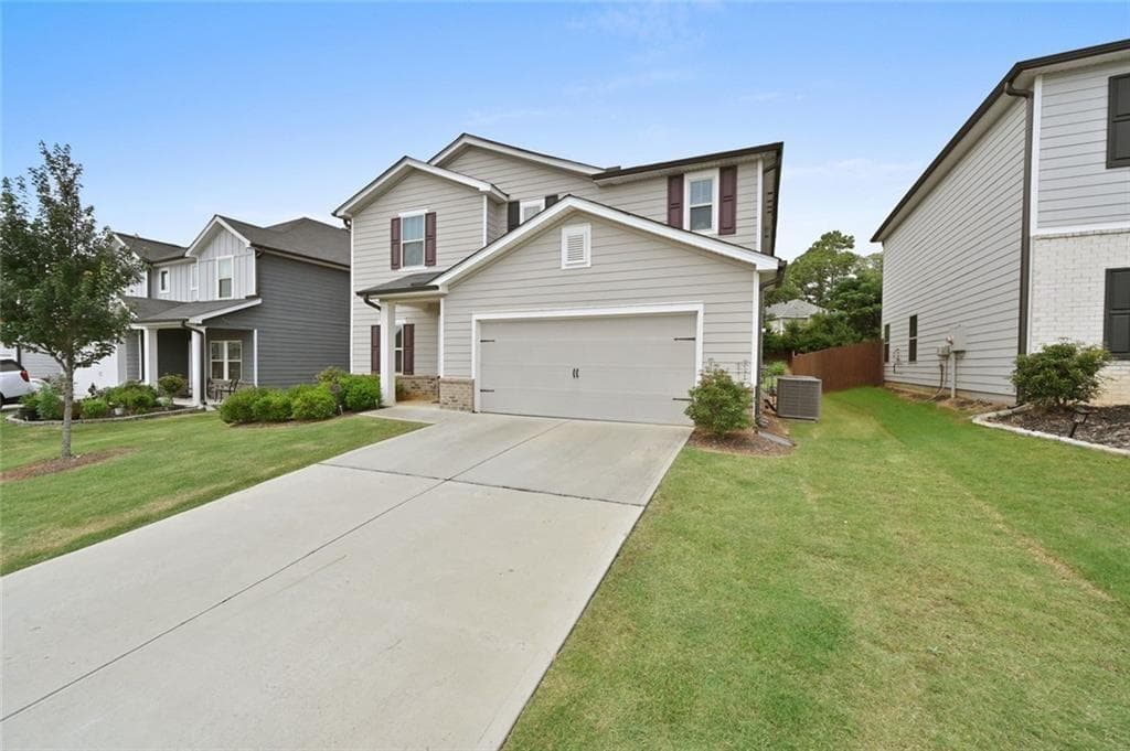 4 bedroom, 3 bathroom, 2,479 sq ft single family residence for sale at 4939 Dufour Drive, Lilburn, GA 30047 — photo 3