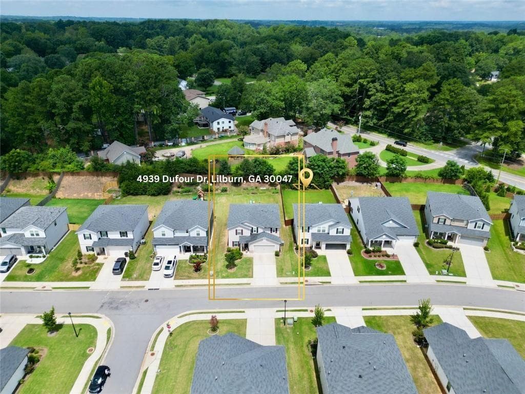 4 bedroom, 3 bathroom, 2,479 sq ft single family residence for sale at 4939 Dufour Drive, Lilburn, GA 30047 — photo 4