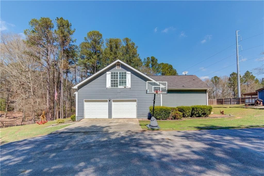 4 bedroom, 3 bathroom, 2,283 sq ft single family residence for sale at 706 Crowell Road, Covington, GA 30014 — photo 2