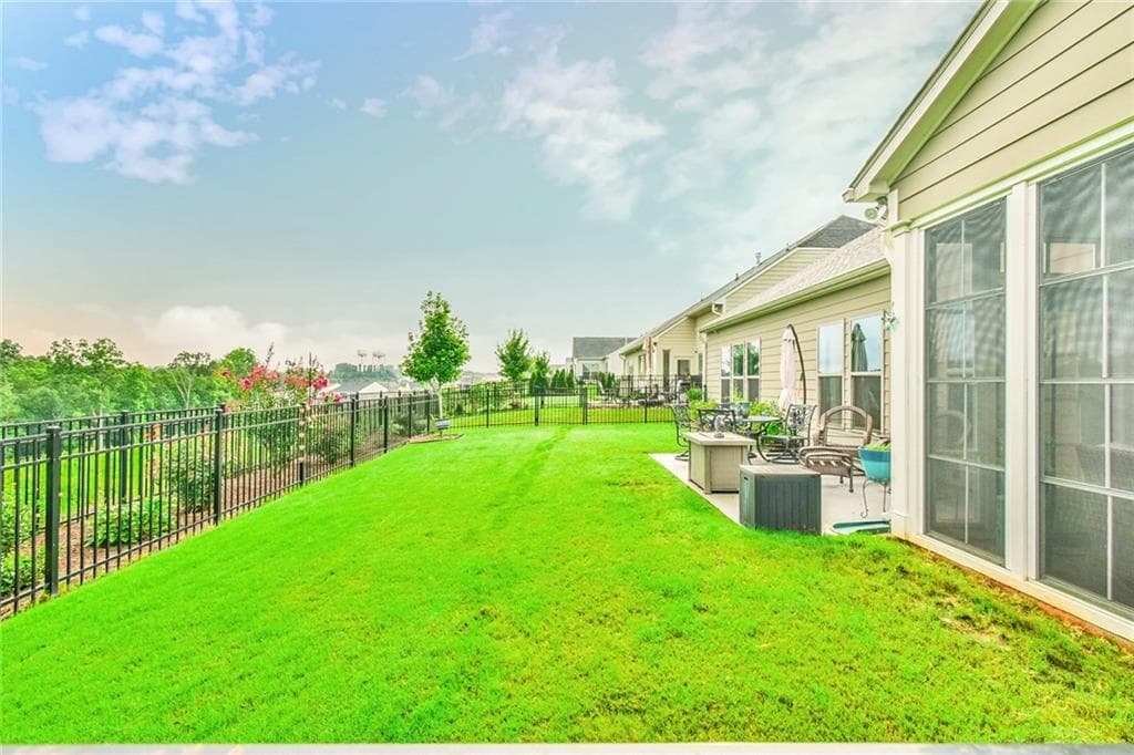 3 bedroom, 4 bathroom, 3,800 sq ft single family residence for sale at 5704 Miravista Way, Hoschton, GA 30548 — photo 4