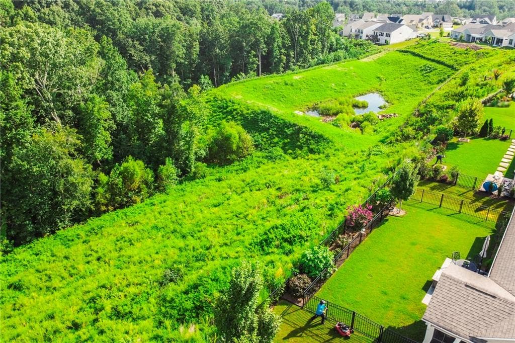 3 bedroom, 4 bathroom, 3,800 sq ft single family residence for sale at 5704 Miravista Way, Hoschton, GA 30548 — photo 9