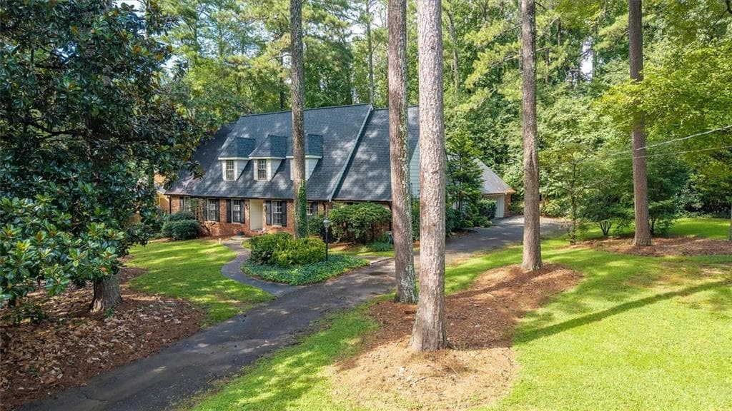 5 bedroom, 3 bathroom, 3,518 sq ft single family residence for sale at 2267 Oxbow Circle, Smoke Rise, GA 30087 — photo 2