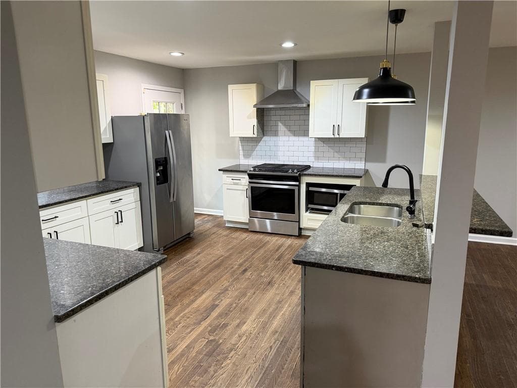 5 bedroom, 3 bathroom, 1,820 sq ft single family residence for sale at 2192 NE Dering Circle, Atlanta, GA 30345 — photo 3