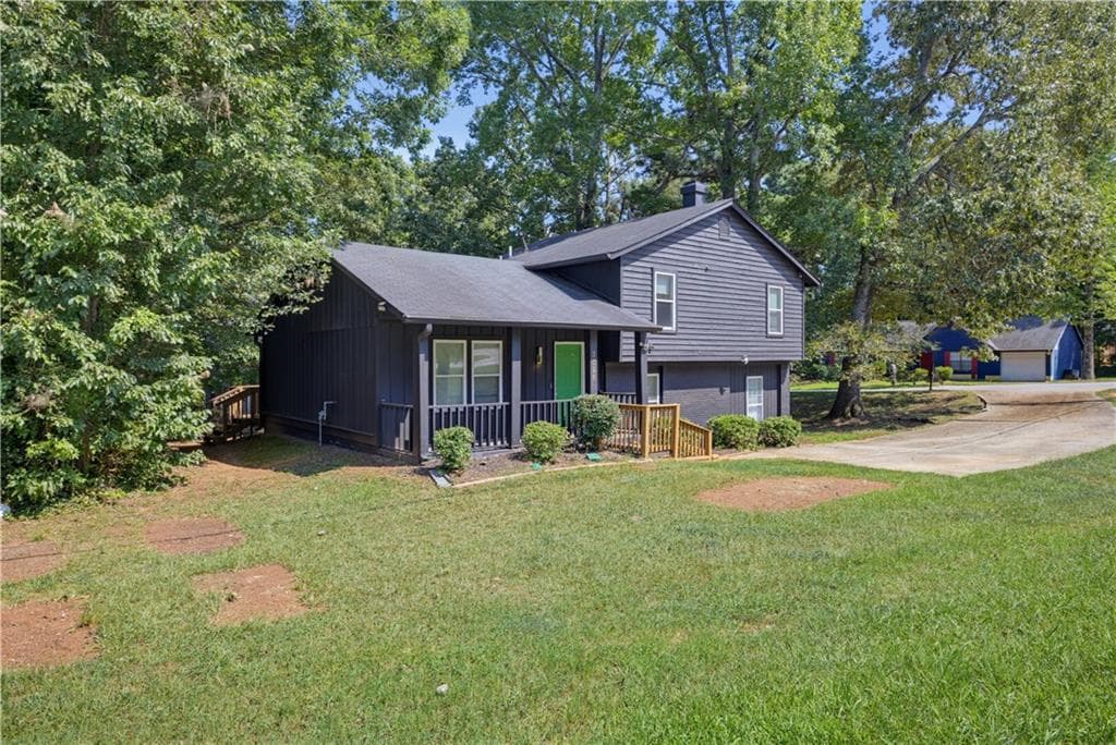 4 bedroom, 2 bathroom, 1,630 sq ft single family residence for sale at 3328 Clevemont Way, Ellenwood, GA 30294 — photo 2