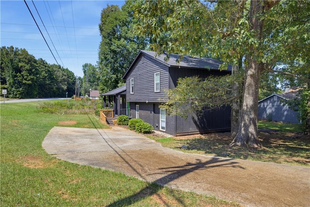 4 bedroom, 2 bathroom, 1,630 sq ft single family residence for sale at 3328 Clevemont Way, Ellenwood, GA 30294 — photo 3