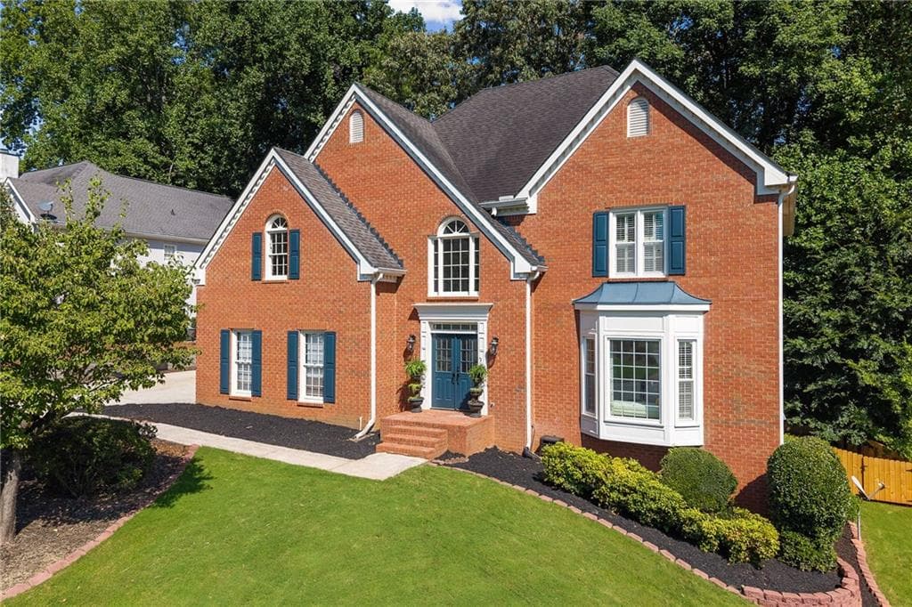 5 bedroom, 5 bathroom, 3,709 sq ft single family residence for sale at 10245 Groomsbridge Road, Johns Creek, GA 30022 — photo 2