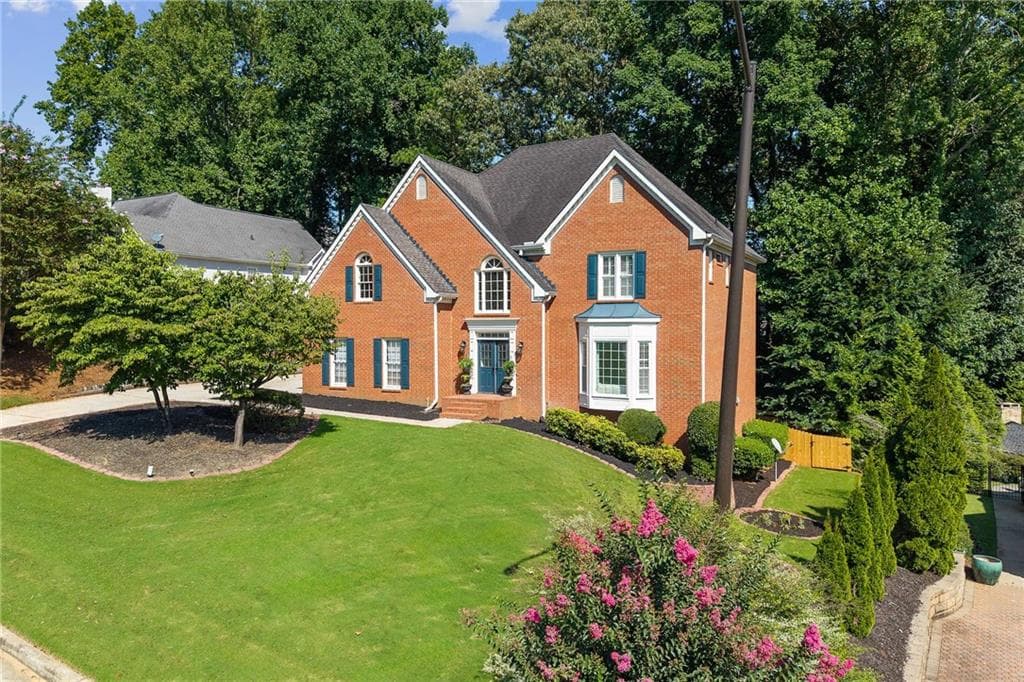 5 bedroom, 5 bathroom, 3,709 sq ft single family residence for sale at 10245 Groomsbridge Road, Johns Creek, GA 30022 — photo 5