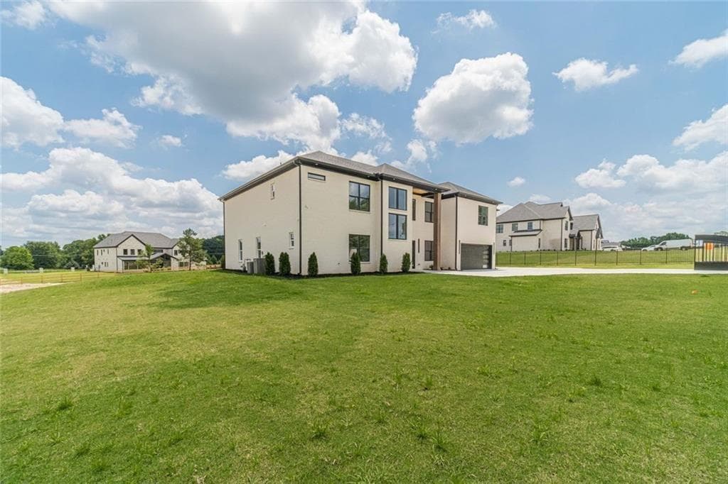 5 bedroom, 6 bathroom, 6,264 sq ft single family residence for sale at 3579 New Hope Road, Dacula, GA 30019 — photo 4