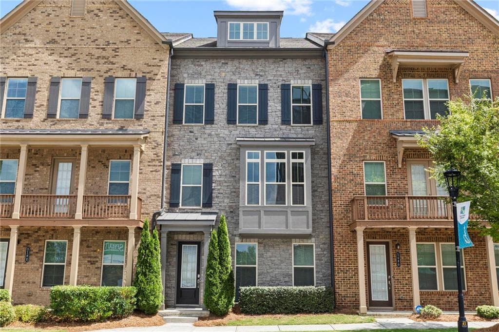 4 bedroom, 4 bathroom, 2,525 sq ft townhouse for sale at 5090 Pinckney Lane, Peachtree Corners, GA 30092