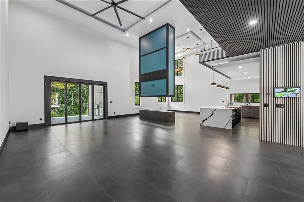 4 bedroom, 5 bathroom, 4,948 sq ft single family residence for sale at 1940 E Bay Street, Hoschton, GA 30548 — photo 5